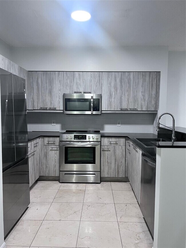 Photo - 5091 NW 7th St Unit 115