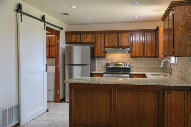 Photo - 13000 S Robinson Ave Casa