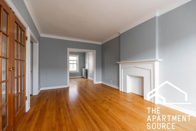 Building Photo - 1319 W Estes Ave Unit 35