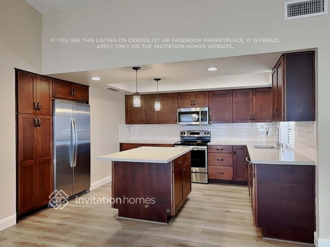 Photo - 8428 Mulcahy Ave