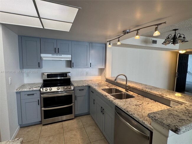 Building Photo - 9122 W Atlantic Blvd Unit 722