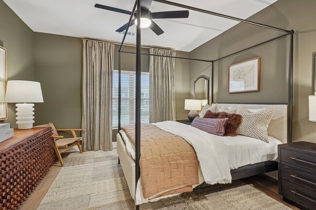Bedroom with Window and Walk-in Closet - The Sylvan at Painted Tree