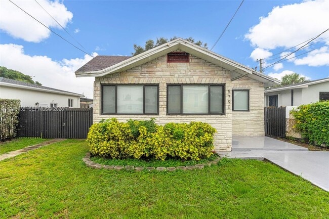 Building Photo - 5790 SW 5th St Unit Front