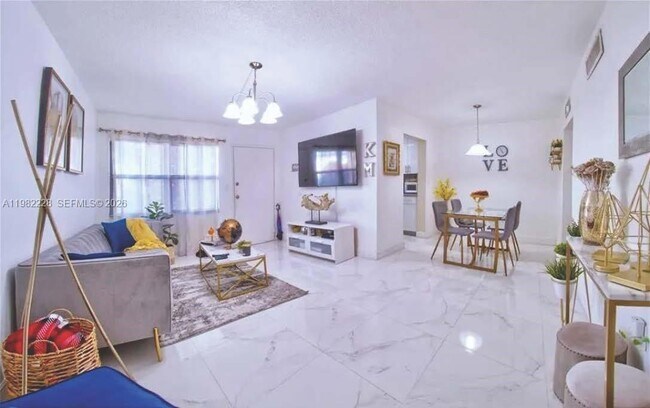 Photo - 1325 W 68th St Unit 113