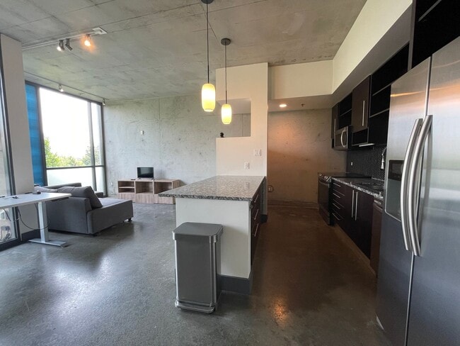 Photo - Awesome 1BR Loft Style Condo Overlooking Midtown!