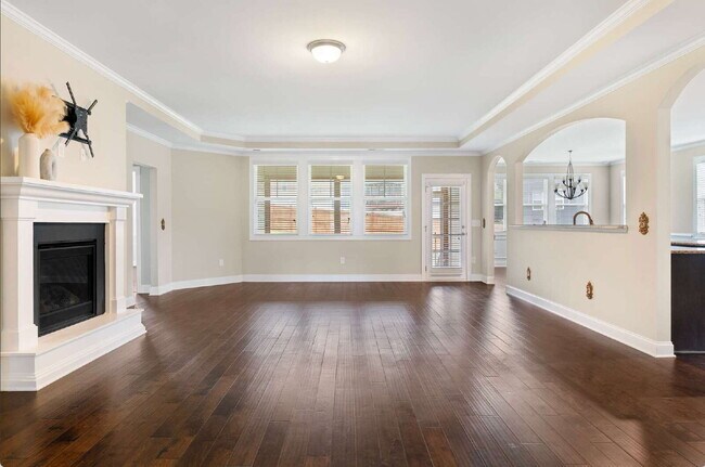 Photo - Luxurious 4-Bedroom Retreat with Third Floor Bonus Room & Fenced-in Backyard