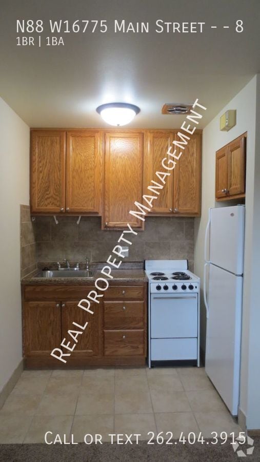 Building Photo - N88W16775-W16775 Main St Unit 8 Rental