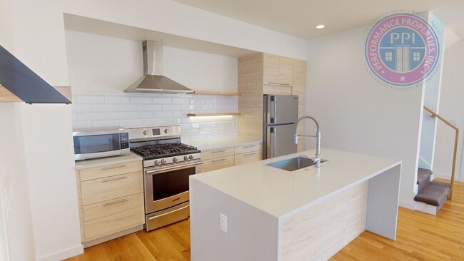 Photo - Modern Townhome In SE Floor to Ceiling Wi...