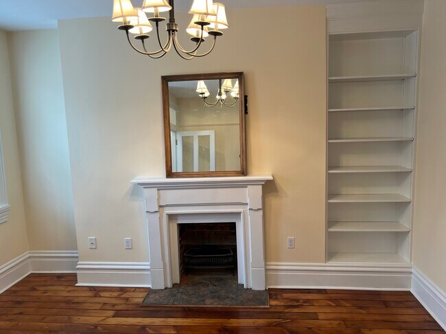 Living room, fireplace and bookcase - 1721 McCullough St
