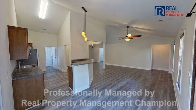 Photo - 3BD/2BA home w/vaulted ceilings, fireplace, 2-car garage, deck and fenced backyard