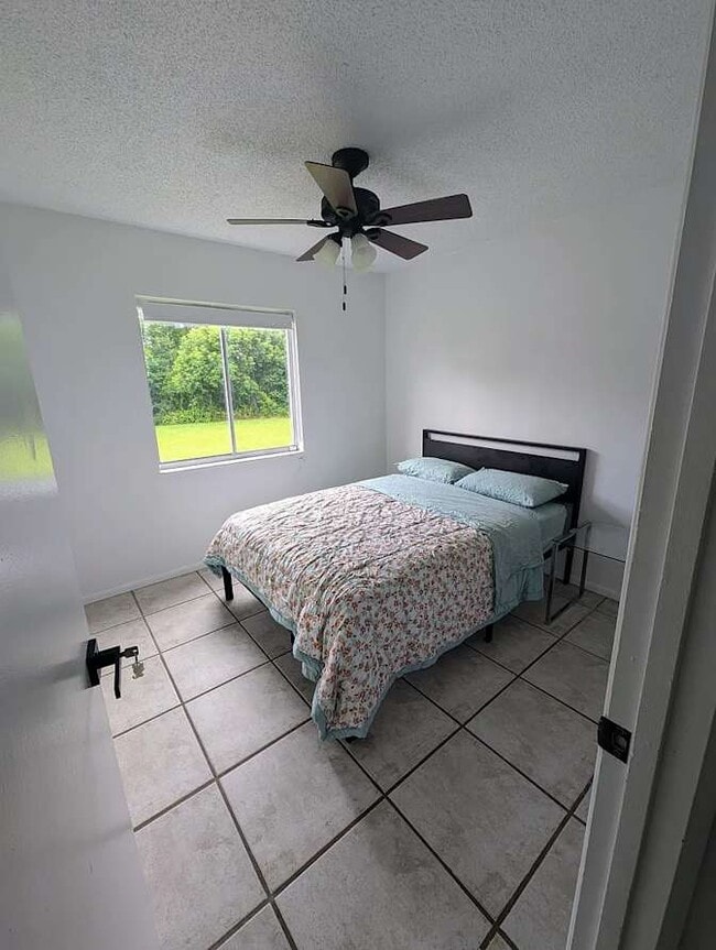Building Photo - 8724 Tall Pine Ln Unit Room 3 shared bath