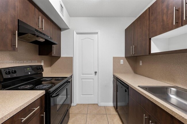 Building Photo - 13 S Royal Poinciana Blvd Unit 4 Rental