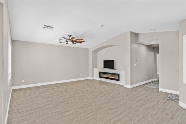 Photo - Stunning 3-Bedroom Townhome with Spacious Backyard & Fireplace