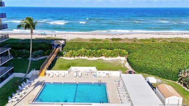 Building Photo - 10044 S Ocean Dr Unit 401
