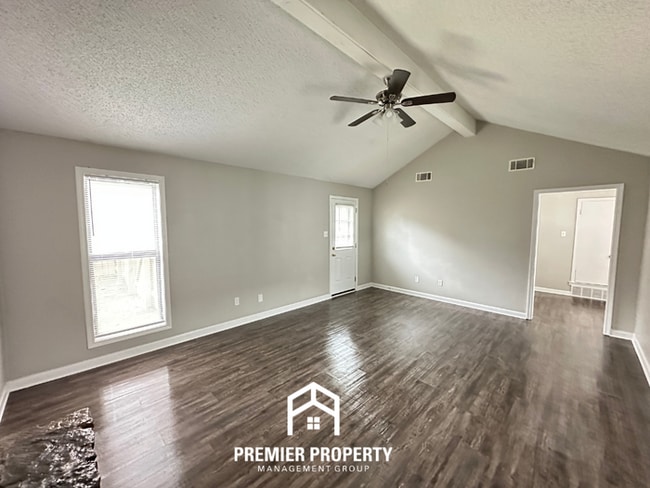 Photo - Quiet 3BR/2BA Cove Near Southwind | Soaring Ceilings & Floor-to-Ceiling Stone Fireplace