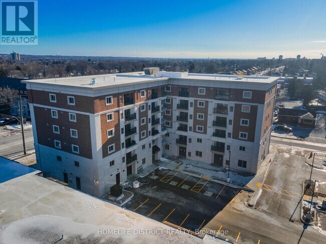 Photo - 976 Simcoe St N Unit 202