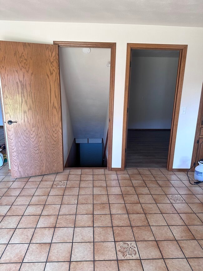 basement stairs and laundry door - 14 Duchess Ct Unit 16 Duchess ct.