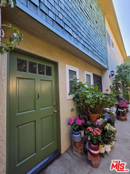 Building Photo - 12740 Pacific Ave Unit 3