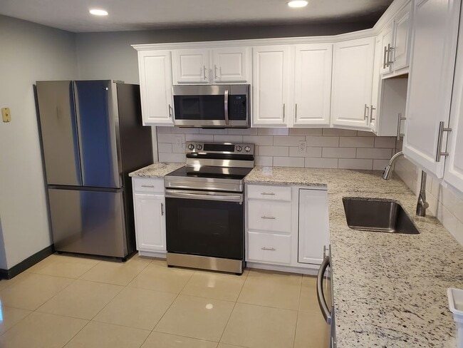 Building Photo - 957 Harrison Ave Unit A