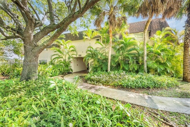 Building Photo - 9107 SW 137th Ter Unit 1-4