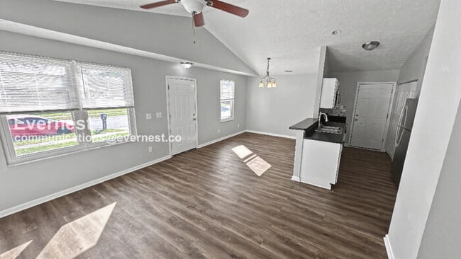 Photo - 4 Bed, 2.5 Bath Home with Fenced Yard & Garage / Pet-Friendly / Available Now!