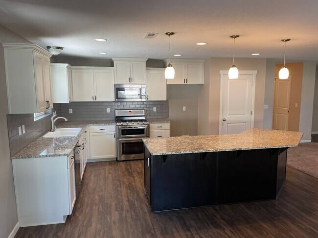 Photo - Mead Schools-4 bedrooms, 2 bathrooms House with 2 Car Detached Garage