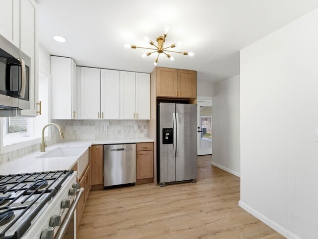 Photo - Charming Renovated 4-Bedroom Rental with Spacious Backyard & Bonus Basement Space in Somerdale