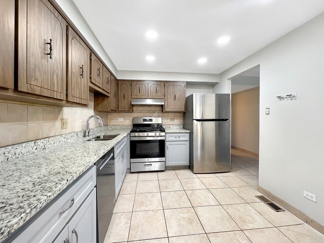 Photo - 10702 Keating Ave Unidad 1S Rental