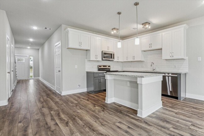 Photo - Be the first to live in this beautifully crafted 3-bedroom, 2.5-bath duplex—newly built and never...