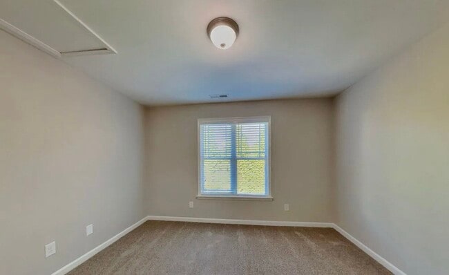 Photo - Spacious 3-Bedroom House with Cozy Living Spaces