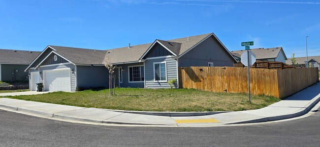 Building Photo - Lots of storage space in this 4- Car garage for all your playthings!!