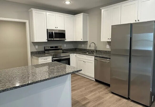 Photo - Beautiful 3BR 2.5BA Townhouse w/ Granite Kitchen • End-Unit on Cul-de-Sac • 1-Car Garage in Pleas...