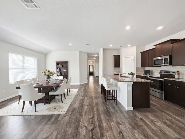 Photo - A stunning 4 bedrooms 3 bathrooms single story home thoughtfully designed for both comfort and fu...