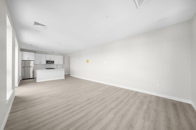 Photo - Modern 2BR / 2BA Condo with Balcony, 2 Covered Parking Spaces & Roof Deck Unit 404