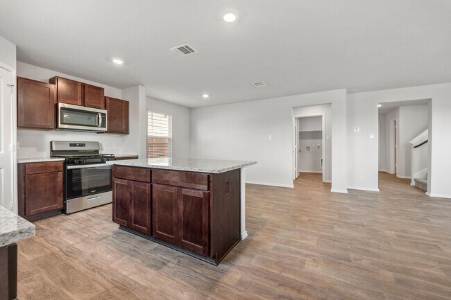 Photo - 2 Week Free Move-In Special!Spacious 4 Bed / 2.5 Bath Home – 2,243 Sq Ft + Resort-Style Amenities