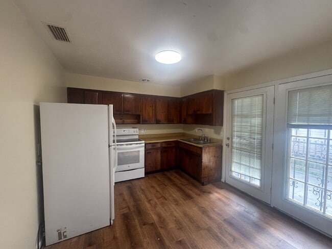 Photo - Cozy 3 Bedroom Home in Quiet Community | Hardwood Floors | Large Yard