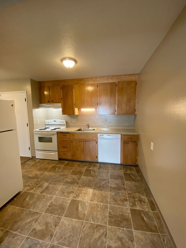 Photo - Keyless Entry • On-Site Laundry • Free WiFi Unit 22