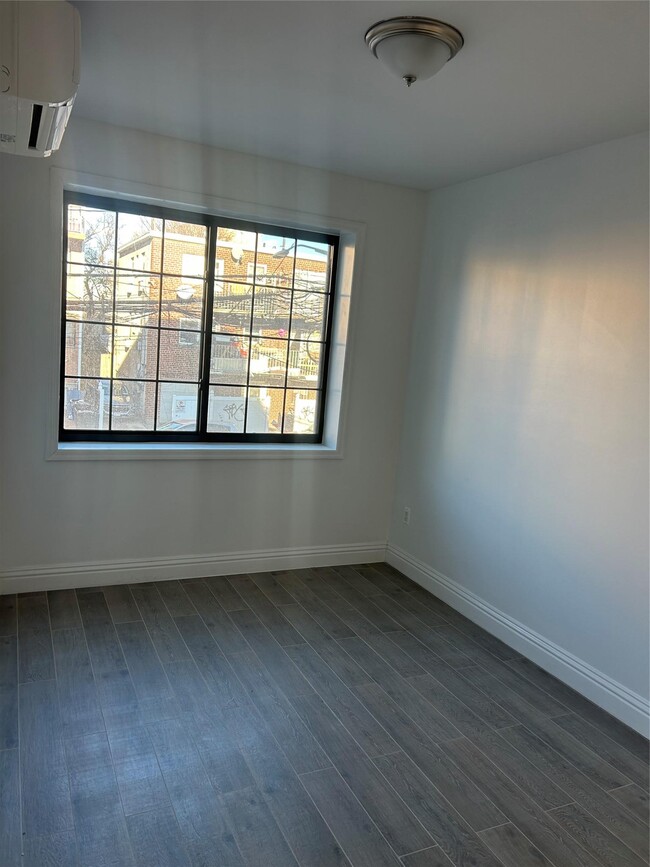 Photo - 55-12-55102 102nd St Apartamento