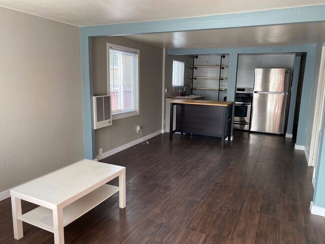 Photo - Little cottage nestled in a street surroun...