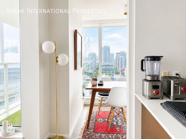 Photo - Bright 1 Bed + Den + Solarium | Pool, Gym & Rooftop Patio