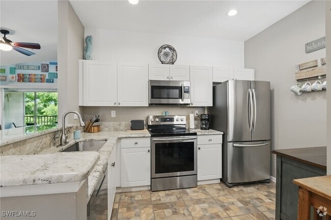 Building Photo - 15430 Bellamar Cir Unit 3023 Rental