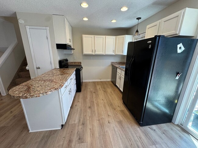 Photo - Charming 3-Bedroom Home with Bonus Living Space and Large Fenced Yard!!