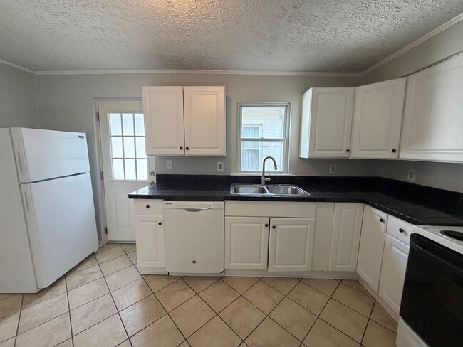 Photo - Charming West Side Home with Covered Porch & First-Floor Laundry