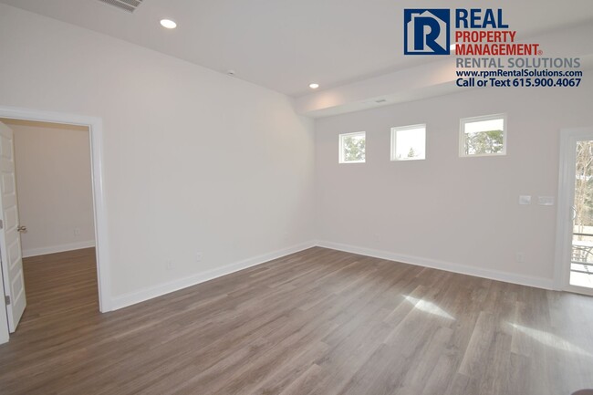 Photo - Gorgeous 4 bd home with attached garage! Neighborhood Pool!