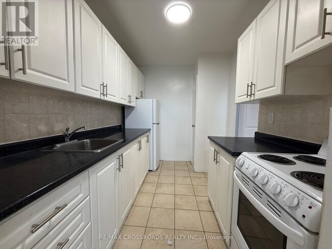Photo - 363 Lakeshore Rd E Unit 504