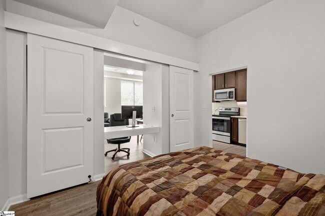 natural lighting acess and 12 ft tall ceilings - 100 E Washington St Unit 23