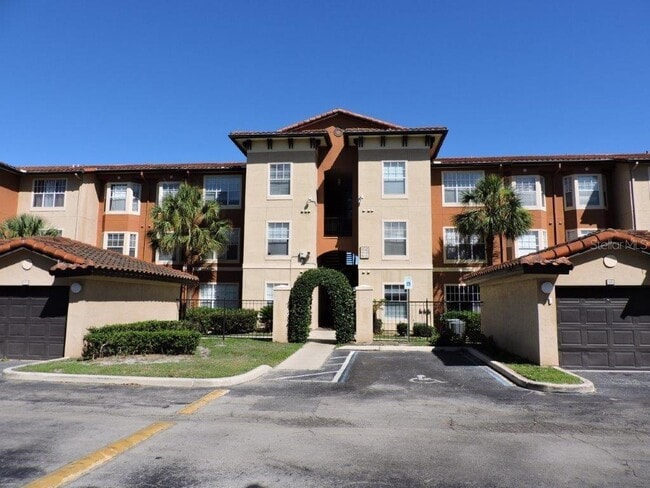 Building Photo - 5542 Metrowest Blvd Unit 7-208