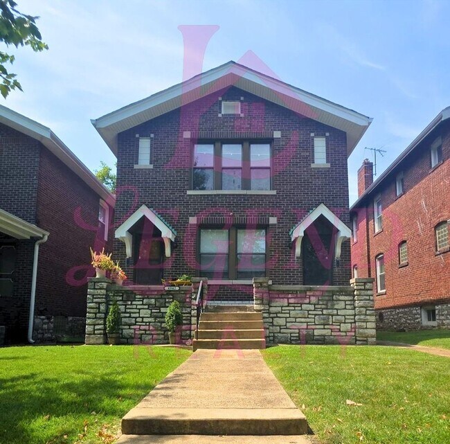 Building Photo - 4942 Tholozan Ave Unit 2