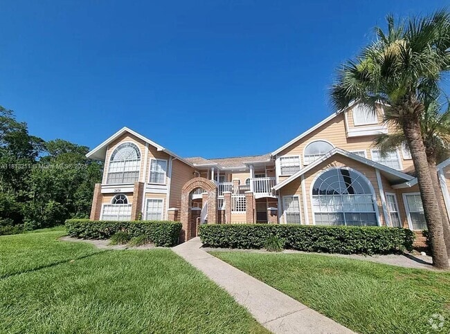 Building Photo - 2474 Sweetwater Club Cir Unit 103 Rental