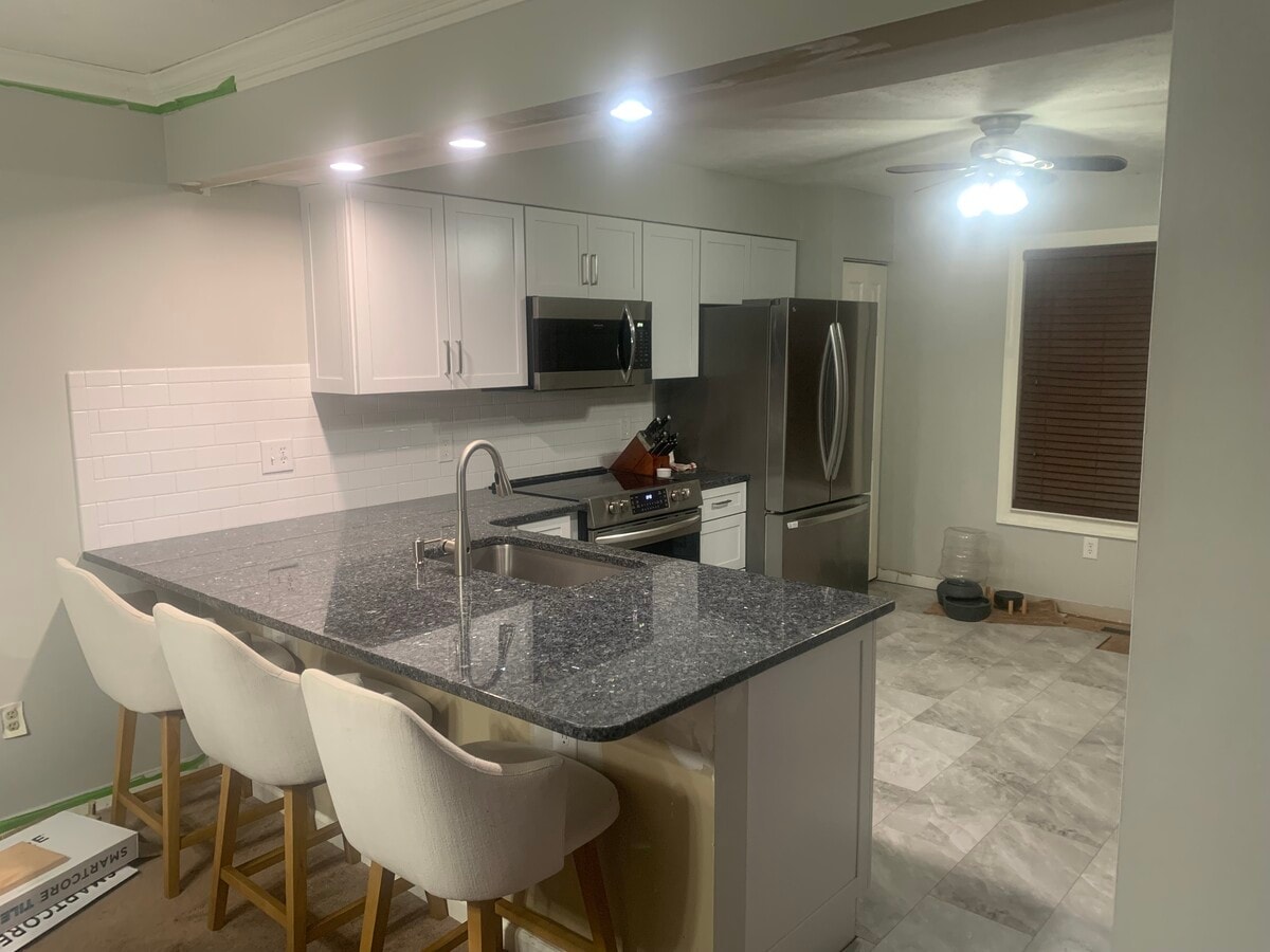 The new flooring is nearly finished. And, the sink has touchless, motion activated, faucet. - 704 Carters Grove Dr